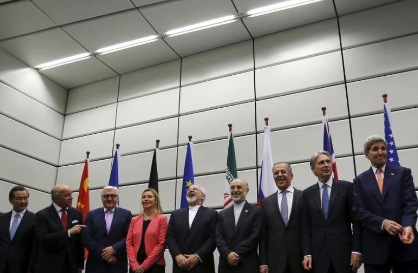 Six world powers adopt nuclear deal with Iran (photo credit: REUTERS)