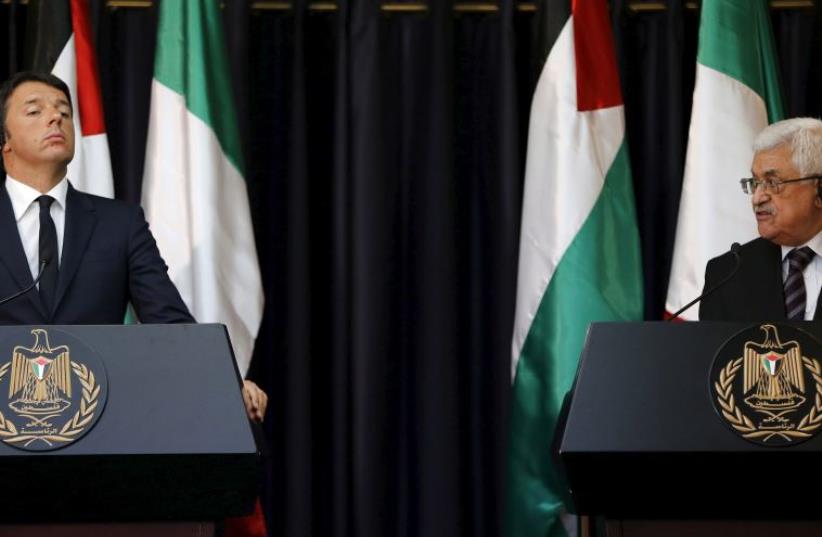 Palestinian President Mahmoud Abbas (R) and Italy's Prime Minister Matteo Renzi  (photo credit: REUTERS)