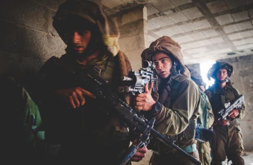 IDF troops take part in a drill near the West Bank town of Kalkilya (photo credit: IDF SPOKESPERSON'S UNIT)