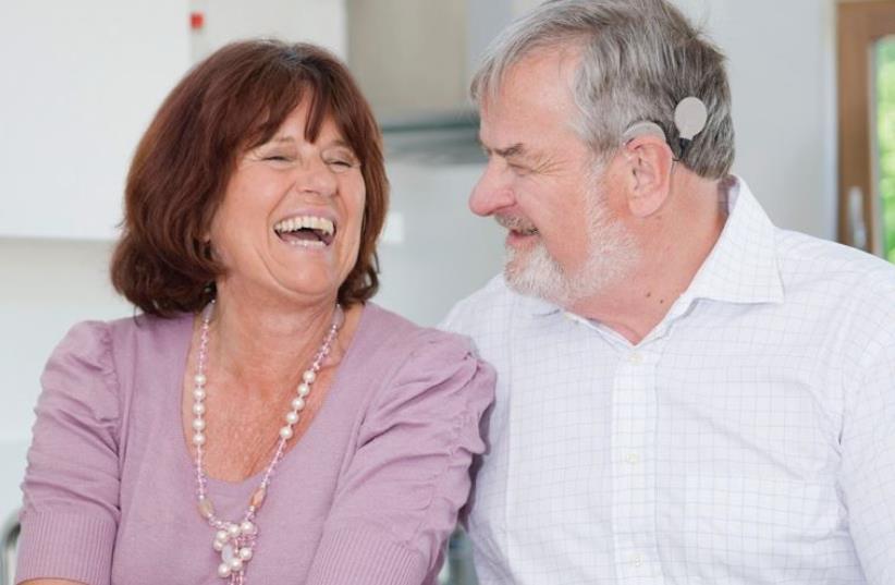 CONVERSATIONS ARE easier when hearing disabled have a cochlear implant (photo credit: MED-EL)