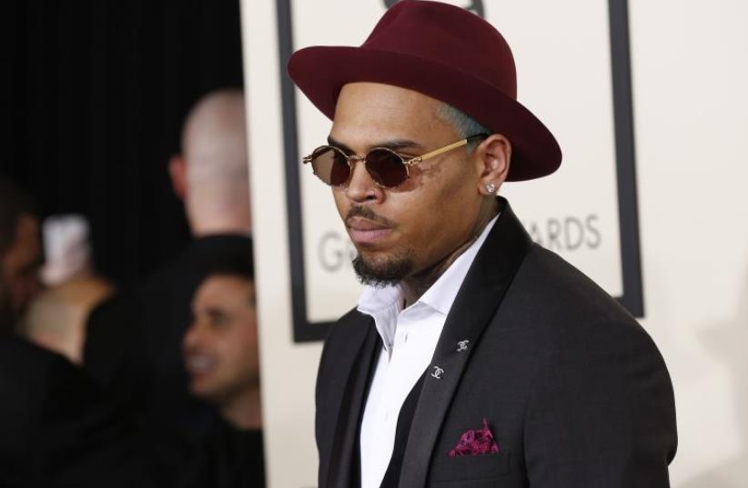 Singer Chris Brown arrives at the 57th annual Grammy Awards in Los Angeles, California February 8, 2015. (photo credit: REUTERS)