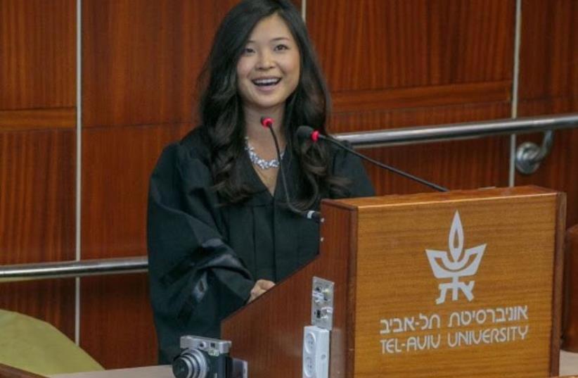 Joy Phua, the valedictorian of the program’s first 50-person class, speaks at graduation. (photo credit: ASAF SHILO)