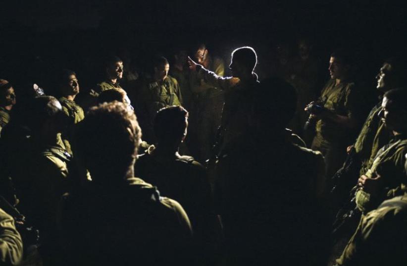 IDF troops prepare to enter Gaza (photo credit: IDF SPOKESPERSON'S UNIT)