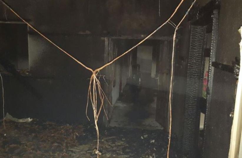 The burnt remains of the Dawabsha family home in Duma where a fire engulfed the house after a molotov cocktail was thrown at it (photo credit: ZAKARIA, RABBIS FOR HUMAN RIGHTS)