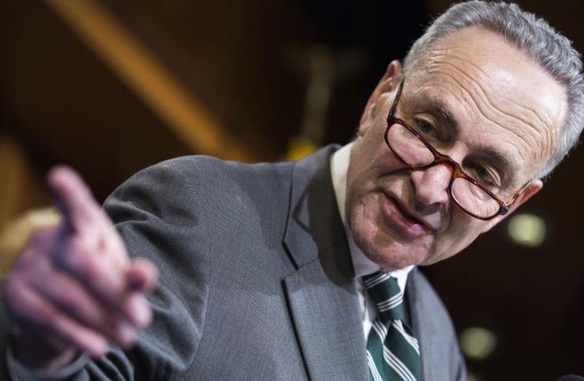Senator Charles Schumer (D-NY) speaks after a vote on legislation for funding the Department of Homeland Security on Capitol Hill in Washington (photo credit: REUTERS)