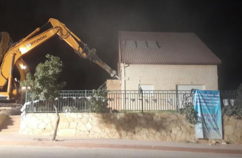 IDF demolishing a home in the West Bank settlement of Eli (photo credit: COURTESY FROM THE SETTLEMENT OF ELI‏)