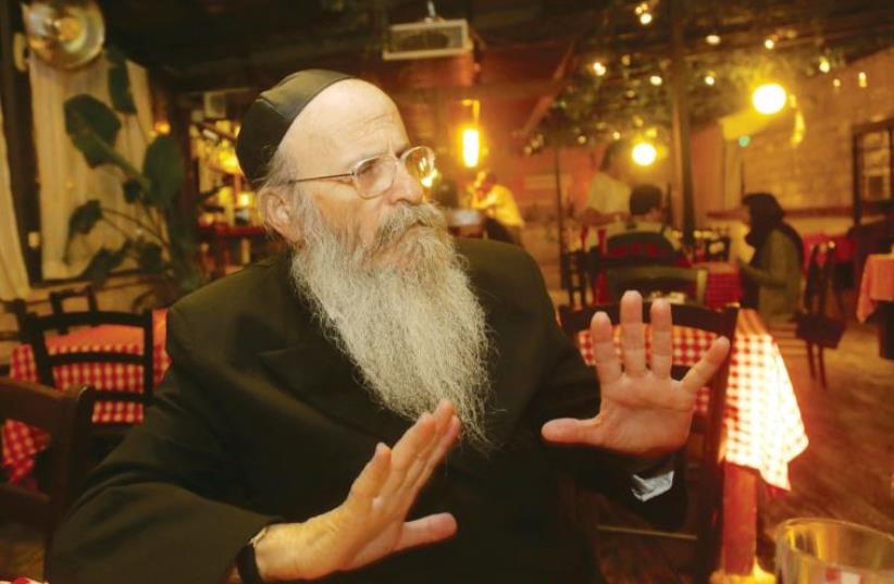 Rabbi Chaim Perkal discusses his innovative project to help autistic children and adults. (photo credit: MARC ISRAEL SELLEM/THE JERUSALEM POST)