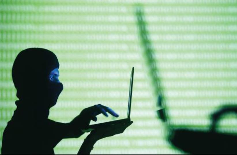 Computer hacking (illustrative) (photo credit: REUTERS)