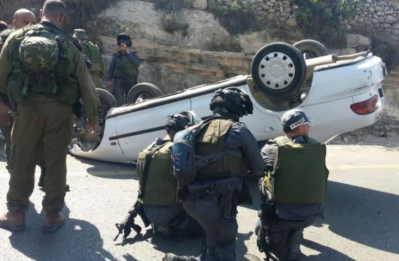 Palestinian strikes Israelis with vehicle in West Bank terror attack (photo credit: TAZPIT)