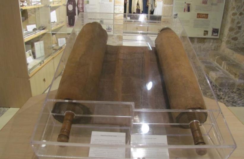 A 16th Century Sephardi Torah scroll at the museum (photo credit: JUDITH SUDILOVSKY)