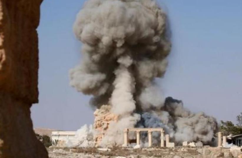 ISIS militants blow up Roman-era temple of Baal Shamin in ancient city of Palmyra (photo credit: ISLAMIC SOCIAL MEDIA)