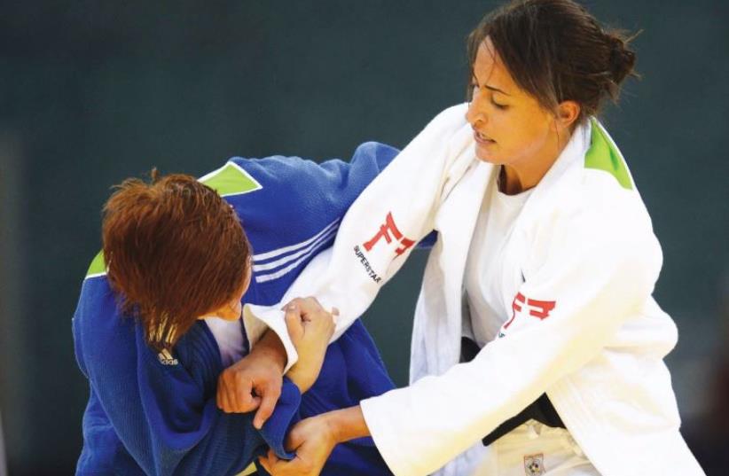 Israeli judoka Yarden Gerbi (right) experienced a disappointing result at the World Championships, losing in the semifinals and the battle for the bronze medal in Astana, Kazakhstan, August 27, 2015 (photo credit: OLYMPIC COMMITTEE OF ISRAEL)