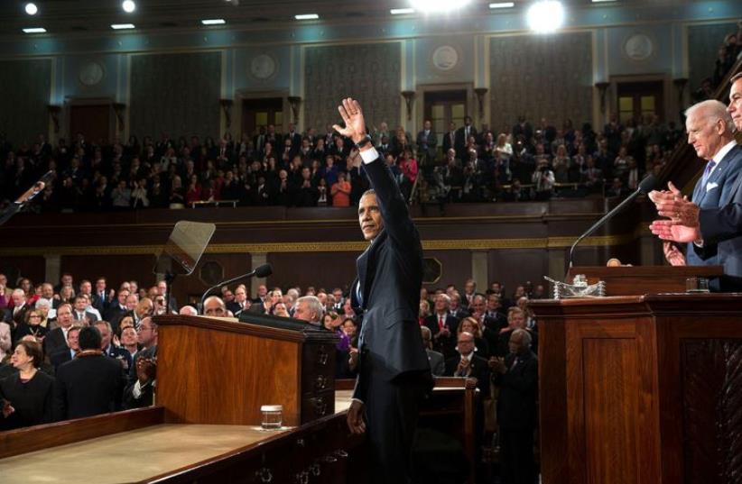US President Barack Obama acknowledges applause during the State of the Union address (photo credit: OFFICIAL WHITE HOUSE PHOTO / PETE SOUZA)