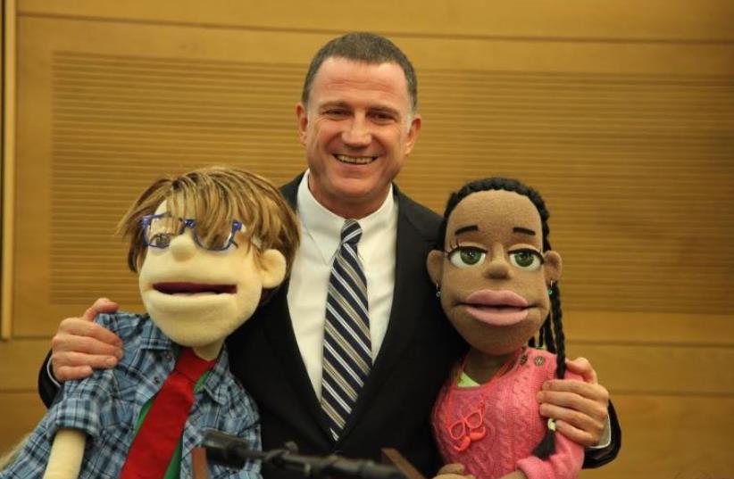 Knesset Speak Yuli Edelstein (C) poses with 'Honorable Knesset' puppets (photo credit: KNESSET SPOKESMAN'S OFFICE)