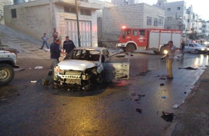 Vehicle of American tourists attacked in Hebron  (photo credit: TAZPIT)
