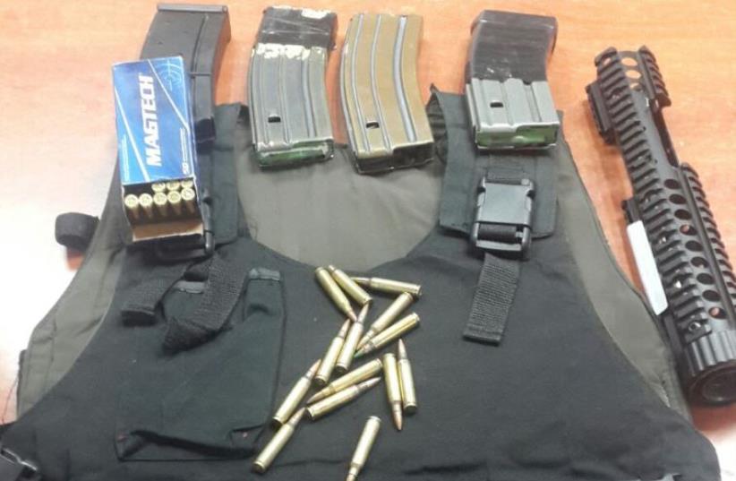 Weapons seized by the IDF during an overnight raid near Hebron. (photo credit: JUDEA AND SAMARIA POLICE)
