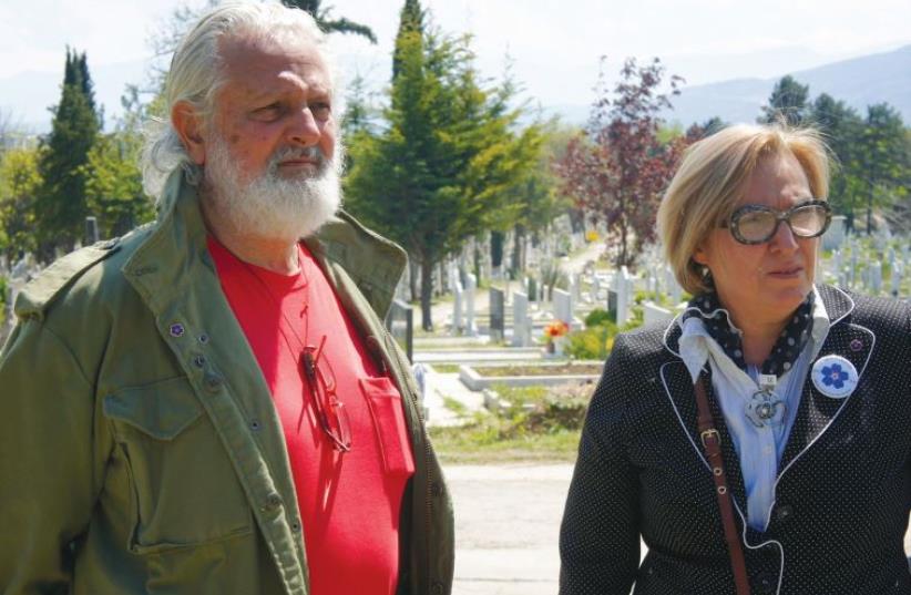 Ricardo Benadon and Jasmina Namiceva visit the Skopje Jewish cemetery (photo credit: PATRICIO BENADON)