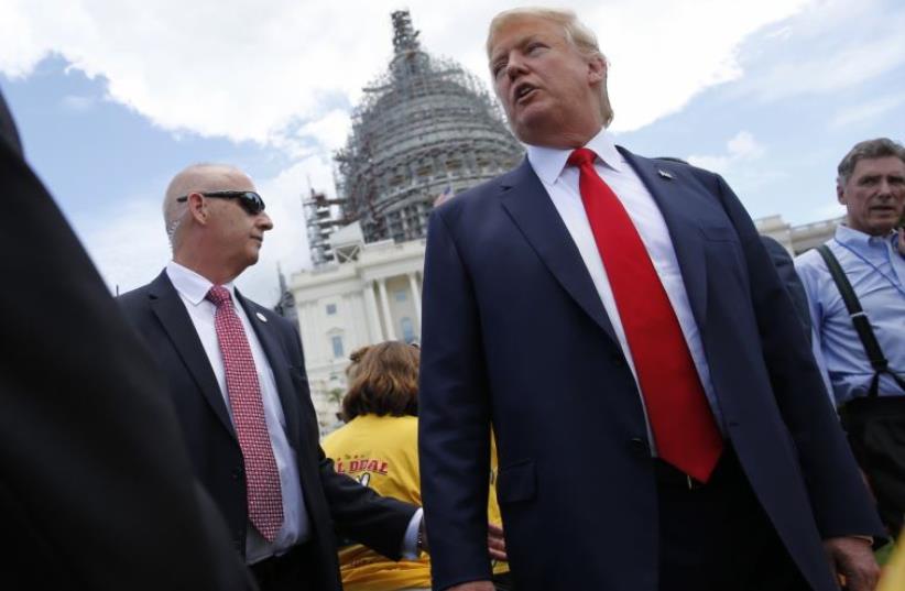 Then-presidential candidate Donald Trump arrives at a Capitol Hill rally to "Stop the Iran Nuclear Deal" in Washington, September 9, 2015 (photo credit: REUTERS)