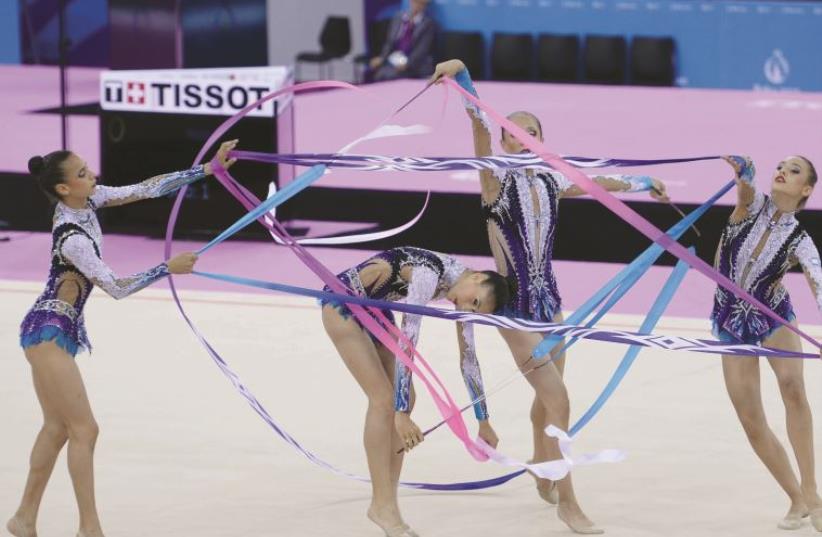 Israel’s national rhythmic gymnastics team booked its place in the Rio Olympics (photo credit: OCI)