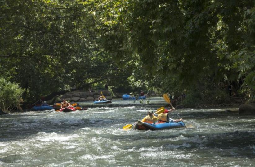 Nature-lovers go rafting on the Jordan River (photo credit: TOURISM MINISTRY)