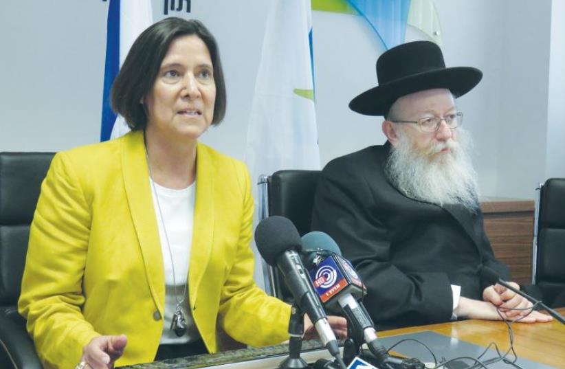 DR. OSNAT LUXENBURG, head of the Health Ministry’s medical technology and infrastructure administration, and Health Minister Ya’acov Litzman announce the new MRI reforms (photo credit: JUDY SIEGEL)