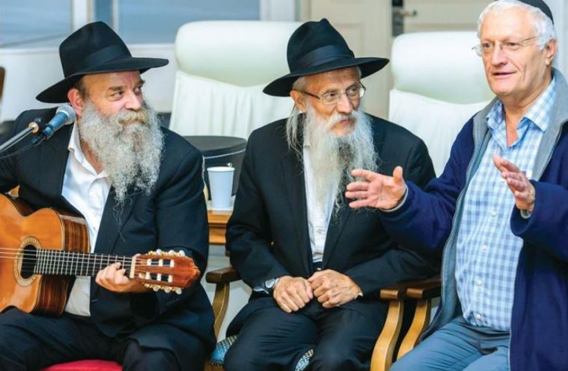 Yosef Mendelevitch (center) , Chaim Chesler (right) and a local Chabad singer in Kazan, Tartarstan, during a meeting between Limmud FSU and Chabad emissaries (photo credit: LIMMUD FSU)