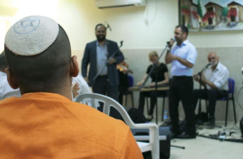 The Israeli Andalusian Orchestra plays traditional music to the prisoners ahead of the High Holy Days (photo credit: BEN HARTMAN)