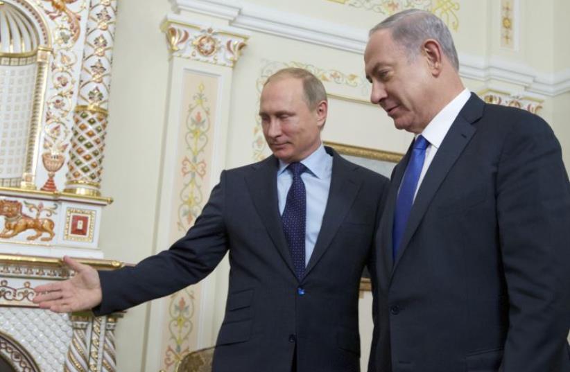 Netanyahu and Putin (photo credit: IVAN SEKRETAREV / POOL / AFP)