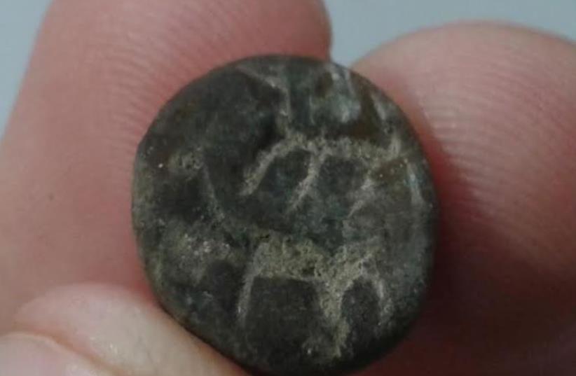 THE RARE stone seal unearthed by the Temple Mount Sifting Project dating to the 10th century BCE.  (photo credit: ZE’EV RADOVAN AND ZACHI DVIRA)