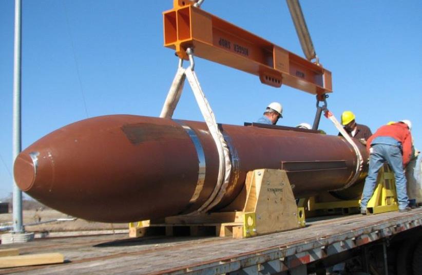 Military bauble: The US Massive Ordnance Penetrator (MOP), precision-guided, 30,000-pound ‘bunker buster’ bomb (photo credit: US DEPARTMENT OF DEFENSE)