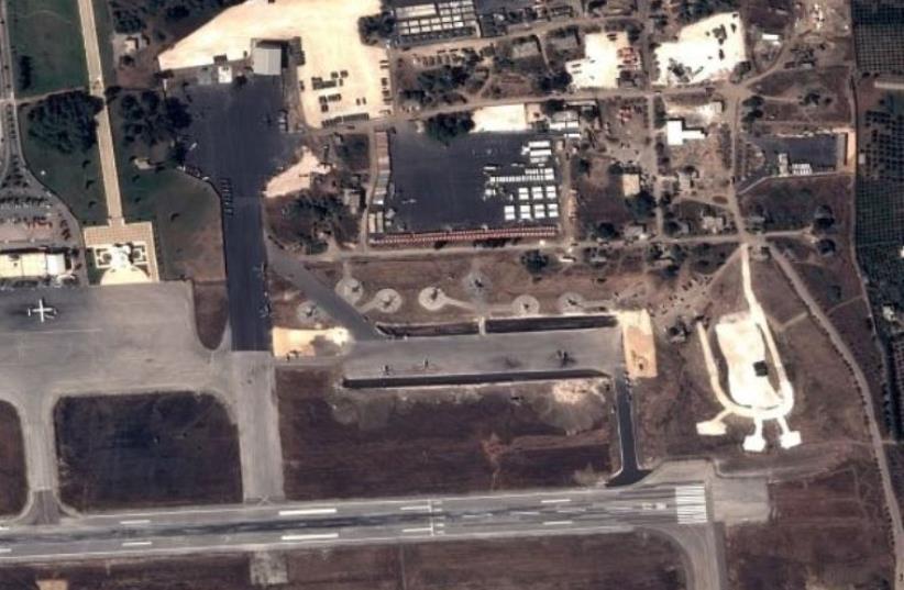 Image by Pleiades Satellite shows Russian fighter jets and helicopters at a military base in the Syrian government-controlled port of Latakia (photo credit: AFP PHOTO)