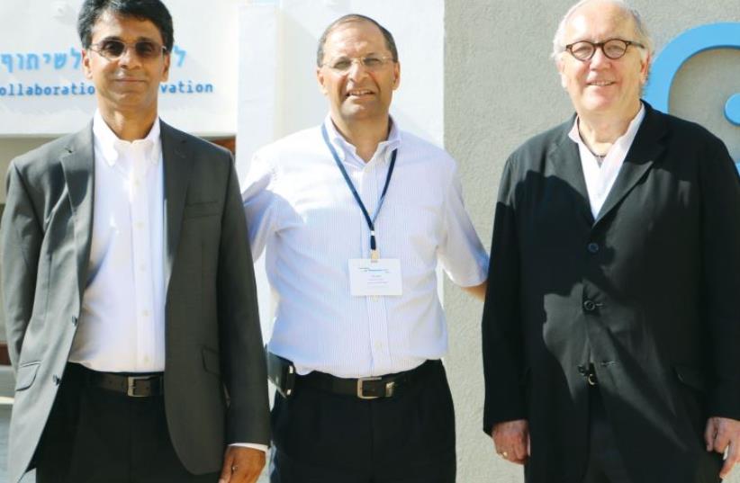 (from left) School planner and designer Prakash Nair; Dr. Amnon Eldar, director general of AMIT Israel schools, and Harvard University professor Richard Elmore outside AMIT’s Gogya center in Ra’anana (photo credit: COURTESY AMIT)