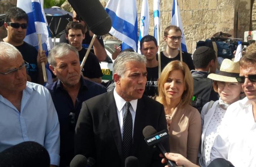 Yesh Atid faction members at Lions Gate in Jerusalem (photo credit: COURTESY YESH ATID)