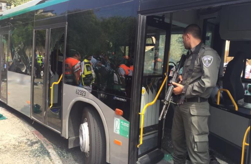 Scene of stabbing and shooting attack aboard a bus in the capital's Armon Hanatziv  (photo credit: ISRAEL POLICE)
