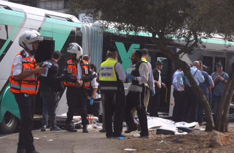Scene of stabbing and shooting attack aboard a bus in the capital's Armon Hanatziv  (photo credit: MARC ISRAEL SELLEM/THE JERUSALEM POST)