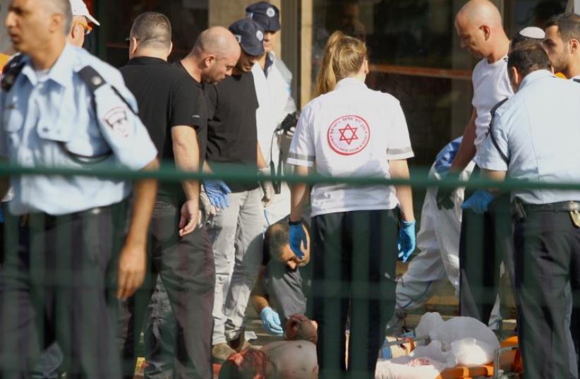 Scene of stabbing attack in Ra'anana (photo credit: JACK GUEZ / AFP)