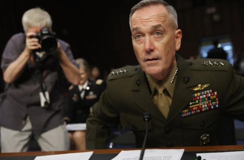 Commandant of the US Marine Corps General Joseph Dunford Jr., the chairman of the US Joint Chiefs of Staff (photo credit: AFP PHOTO)