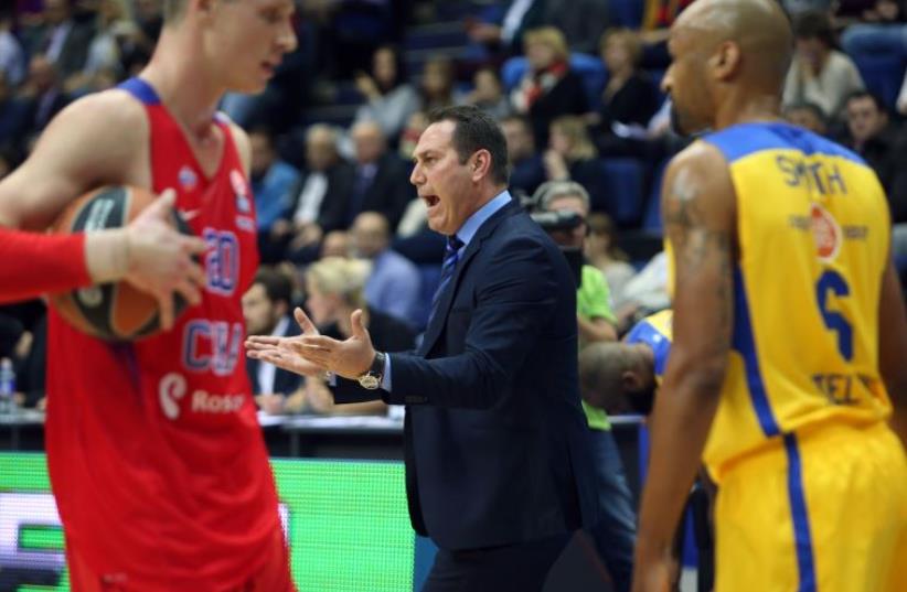 Maccabi Tel Aviv coach Guy Goodes (center) couldn’t hide his frustration with his team’s performance in last night’s 100-69 defeat at CSKA Moscow. (photo credit: UDI ZITIAT)
