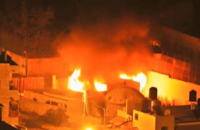 Joseph's Tomb set ablaze by Palestinian rioters ‏ (photo credit: Courtesy)