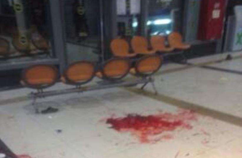Blood at the scene where terrorist was shot at the Beersheba central bus station on October 18, 2015 (photo credit: ISRAEL POLICE)