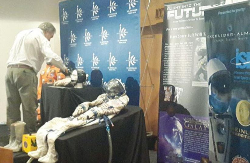 AN ASTRONAUT SUIT sits on display at the International Astronautic Congress in the capital’s Jerusalem International Convention Center last week. (photo credit: ORIT HAZON MENDEL)