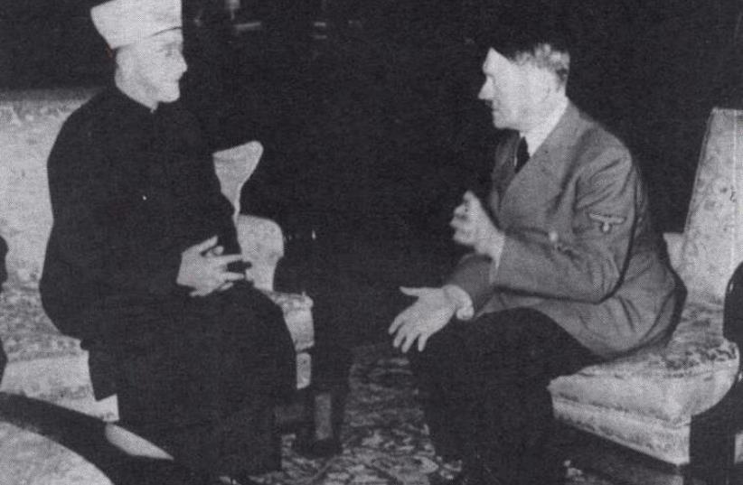 German dictator Adolf Hitler (R) and the grand mufti of Jerusalem, Haj Amin Al-Husseini, meet in Berlin on November 30, 1941 (photo credit: AFP PHOTO)