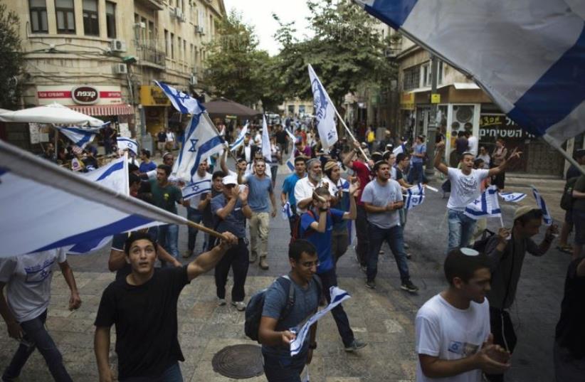 PEOPLE demonstrate in downtown Jerusalem this week. (photo credit: REUTERS)