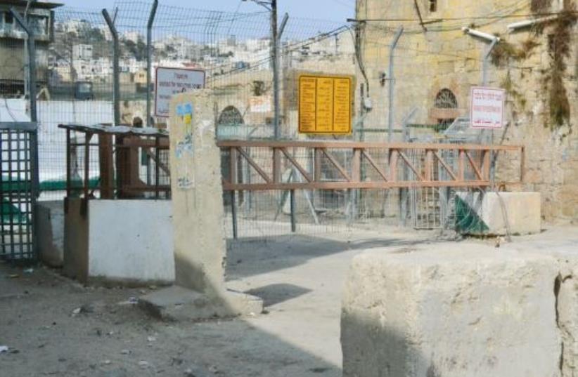 A checkpoint leading from the H1 Palestinian side to the H2 Israeli side, a frequent site of rock throwing by Palestinians at Israeli soldiers (photo credit: LAURA KELLY)