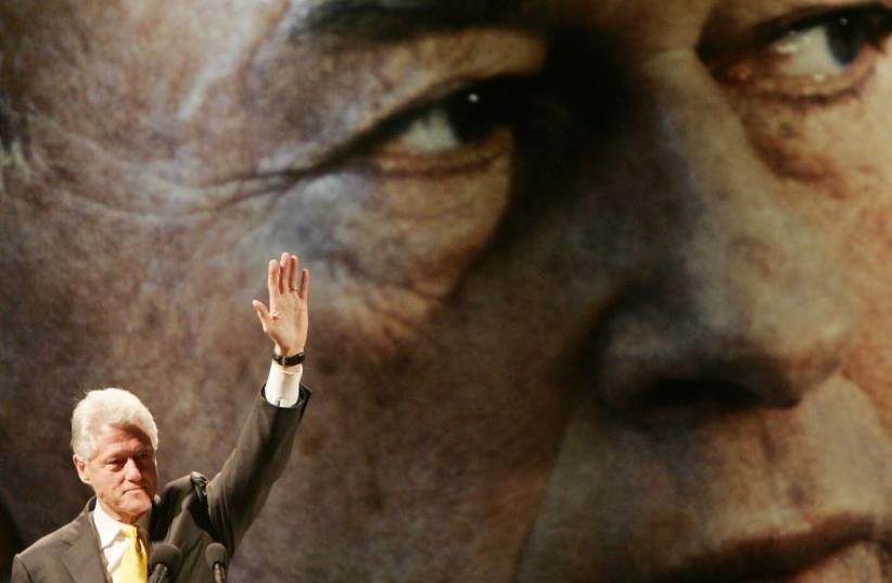 Bill Clinton addresses a rally in Tel Aviv to remember Yitzhak Rabin in 2005 (photo credit: REUTERS)