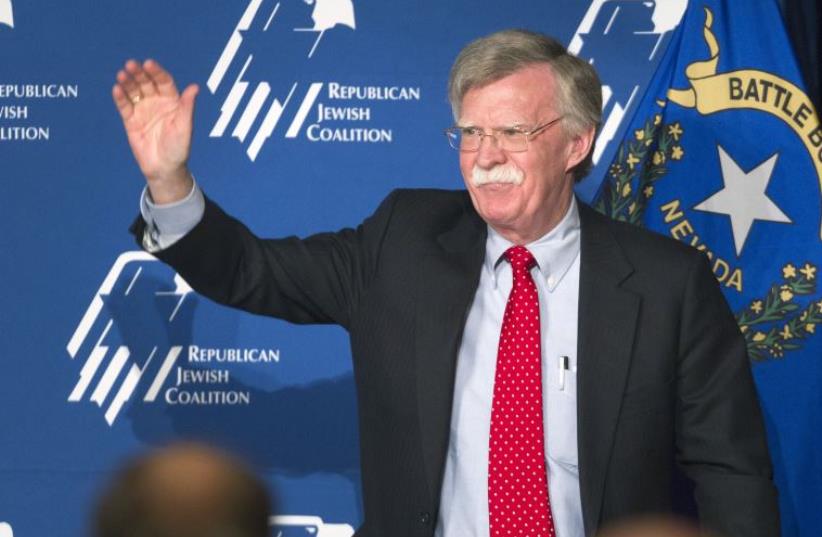 John Bolton, former US ambassador to the United Nations, leaves the stage after speaking on US foreign policy during the Republican Jewish Coalition Spring Leadership Meeting in Las Vegas (photo credit: REUTERS)