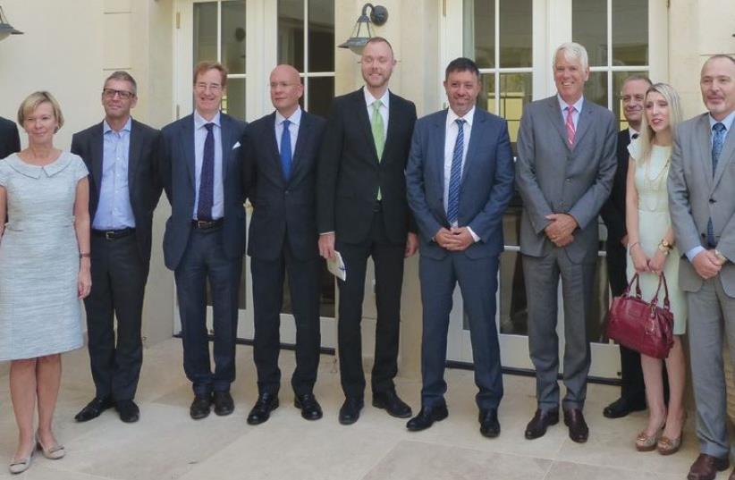 Environmental Protection Minister Avi Gabbay (center) meets with EU Ambassador to Israel Lars Faaborg-Andersen and other ambassadors of EU countries in Herzliya yesterday to address climate change (photo credit: Courtesy)