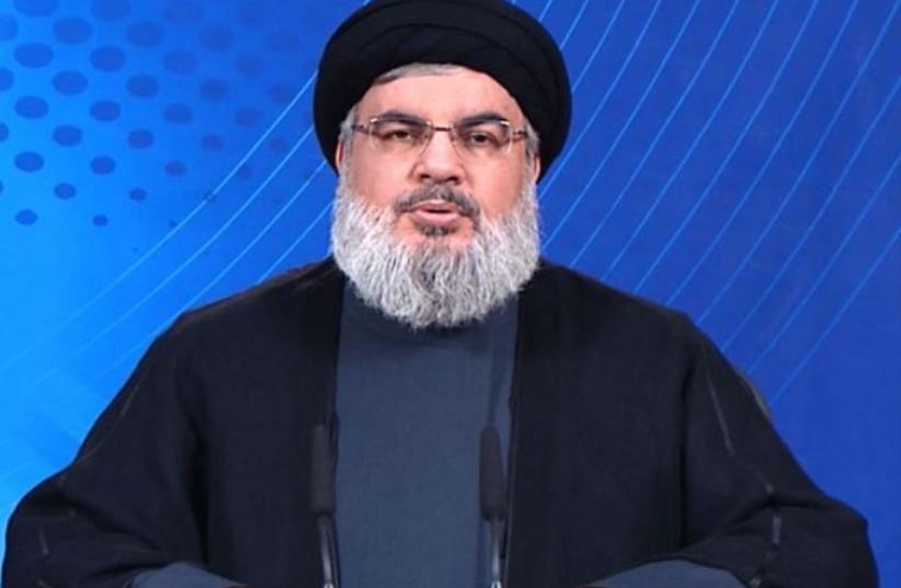 Hezbollah Secretary-General Hassan Nasrallah appears on Al-Manar television (photo credit: AFP PHOTO)