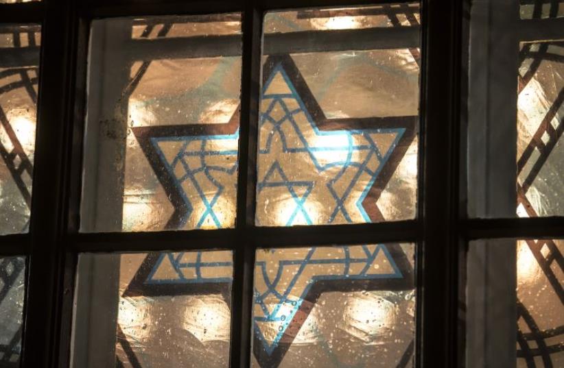 A window is pictured with the Star of David in a new synagogue in Cottbus, Germany (photo credit: REUTERS)