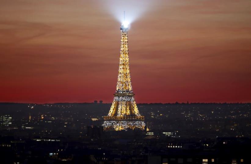 The Eiffel Tower is seen at sunset in Paris (photo credit: REUTERS)